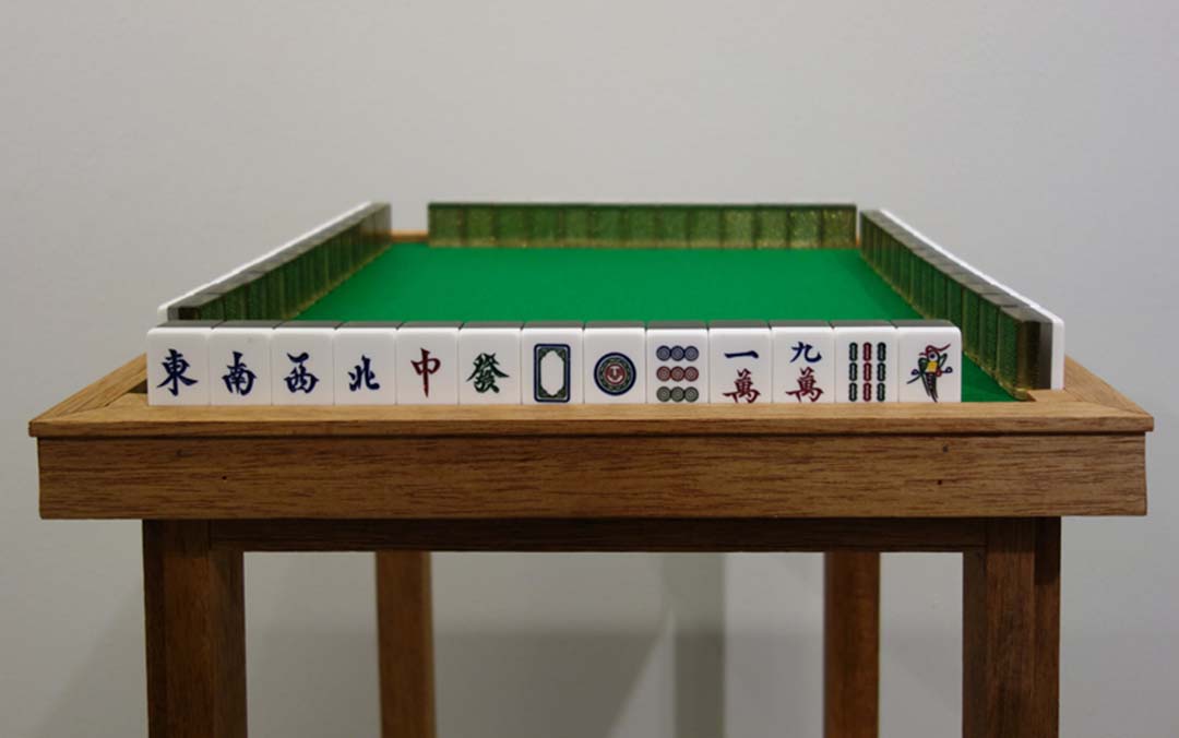 A custom-made table and mahjong tiles from It’s a Set Situation.